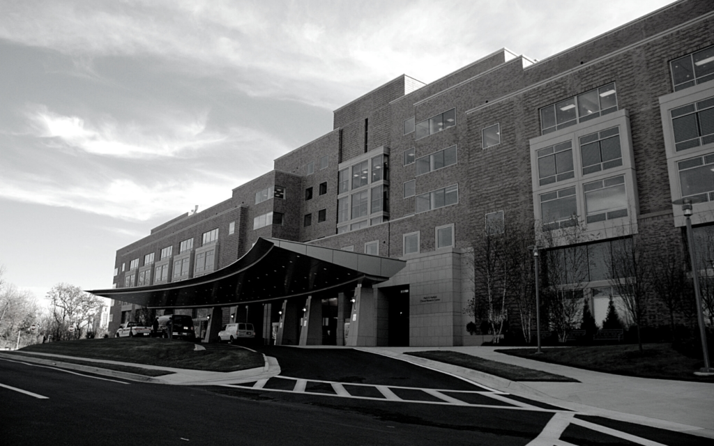 Black and white image of a hospital. 