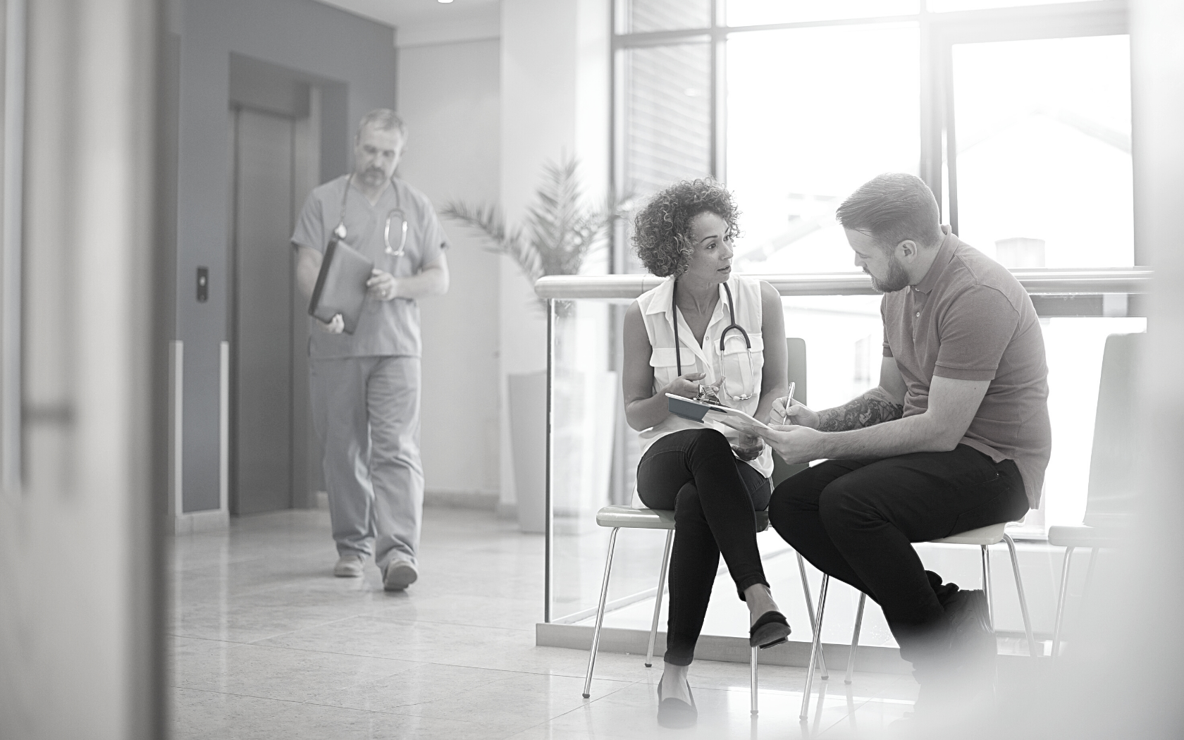 Doctor discusses medical consent with patient.