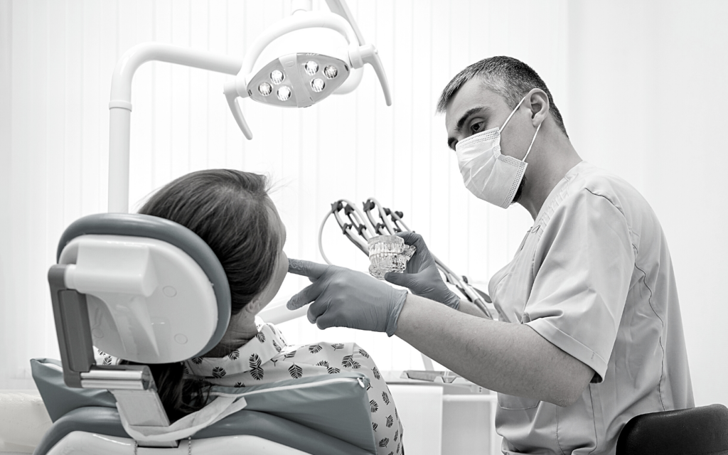 Patient receiving orthodontic treatment from orthodontist.