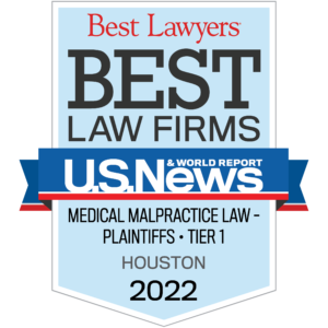 Blue US News badge with text: Best Law Firms Medical Malpractice Law Plaintiffs Tier 1 Houston 2022