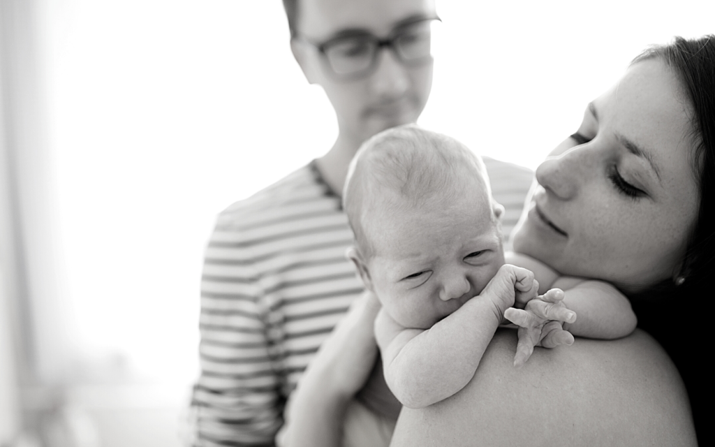 Parents with their newborn baby.