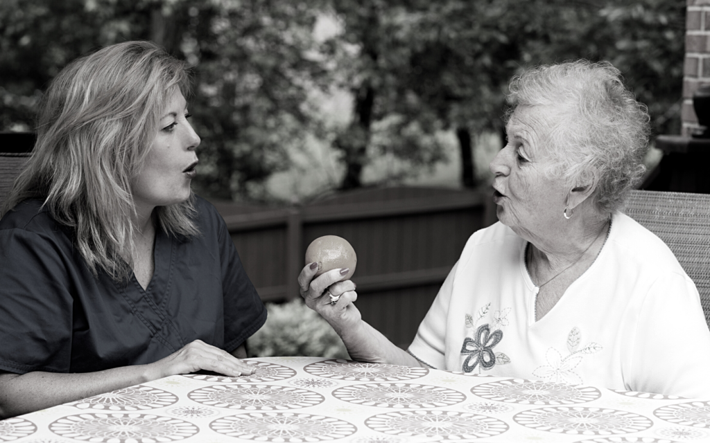 Woman receives speech therapy after stroke.