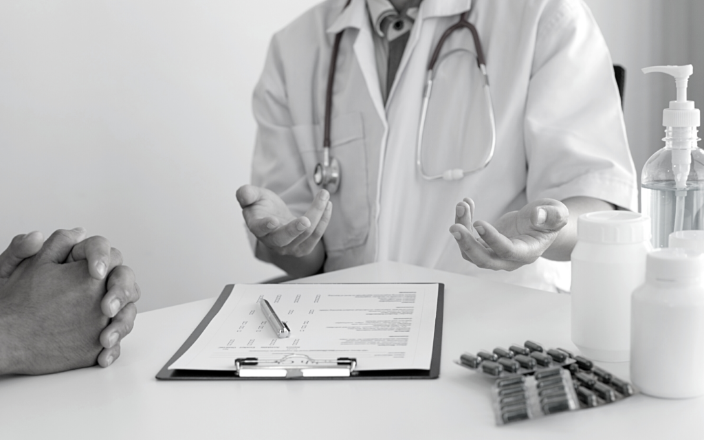 Doctor and patient discuss care.