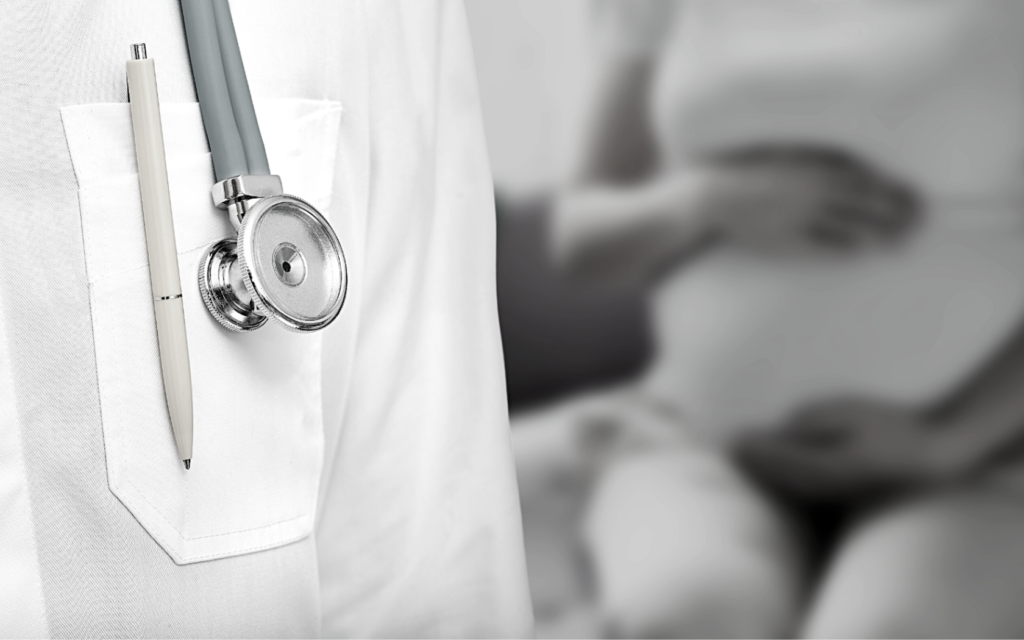 A doctor's stethoscope and pen. 