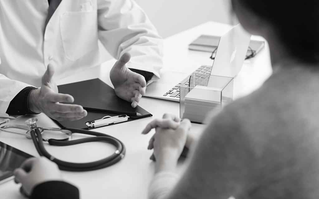 A doctor discusses HIE with baby's concerned parent.