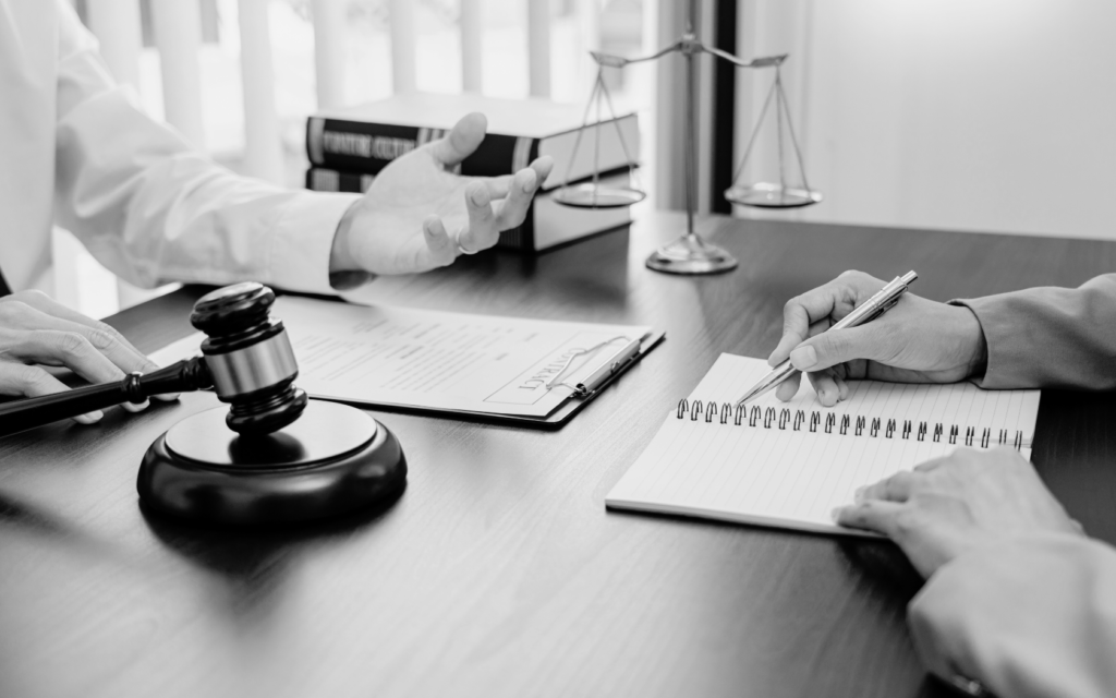 A parent consulting with a lawyer about a cerebral palsy birth injury case.