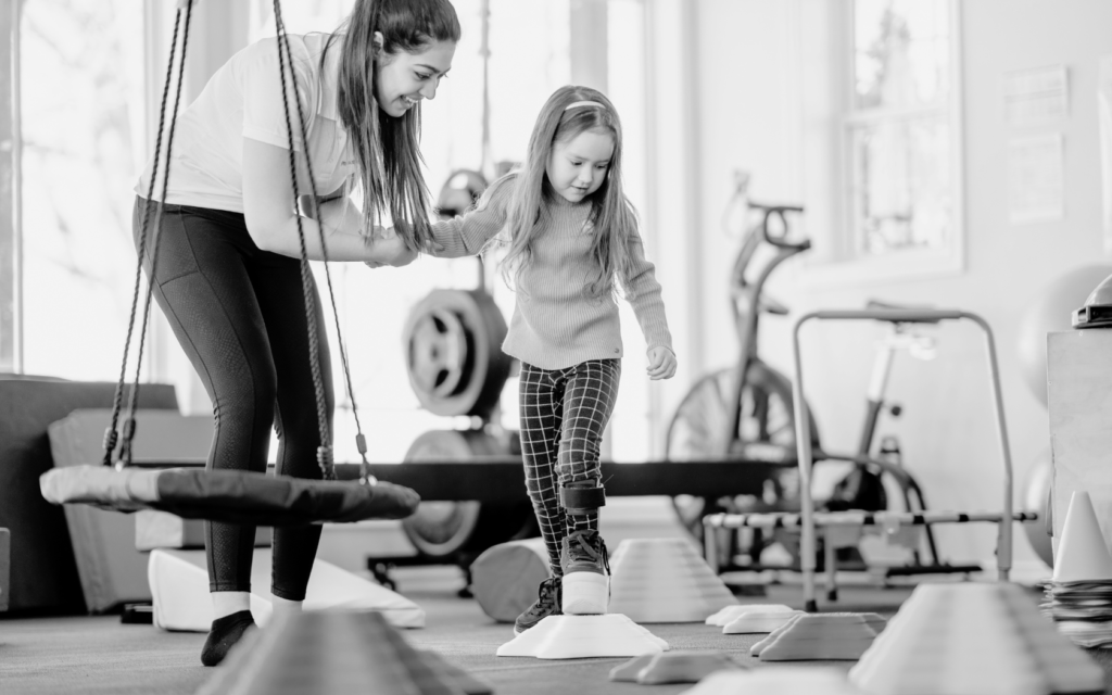 Young girl in a physical therapy session.